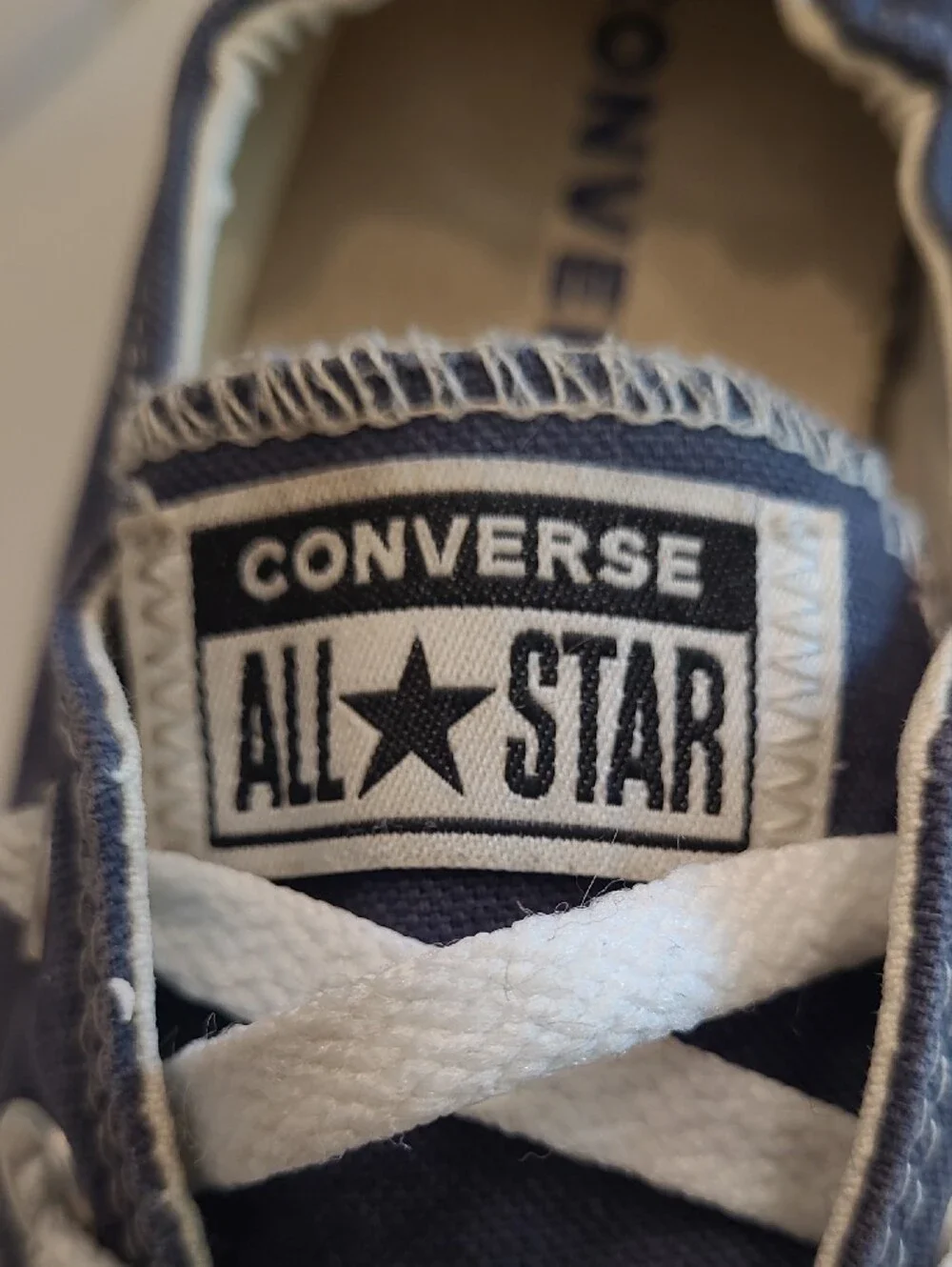 Converse Chuck Taylor All-Star Classic Low Top Lace Up Blue Trim Canvas Sneaker